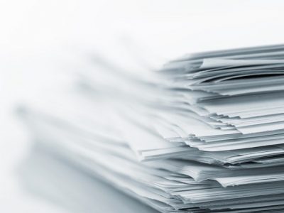 Stack of white papers isolated on white